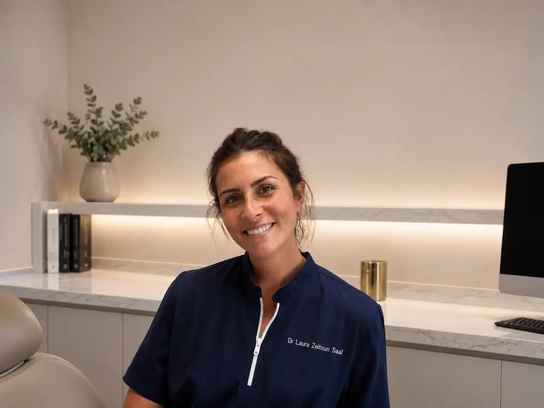 Dr Laura Zeitoun Saal seated in a treatment room at her Paris 8 practice